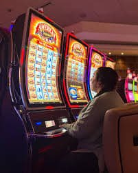 Free spins bonus round showing money symbols being collected with multiplier display